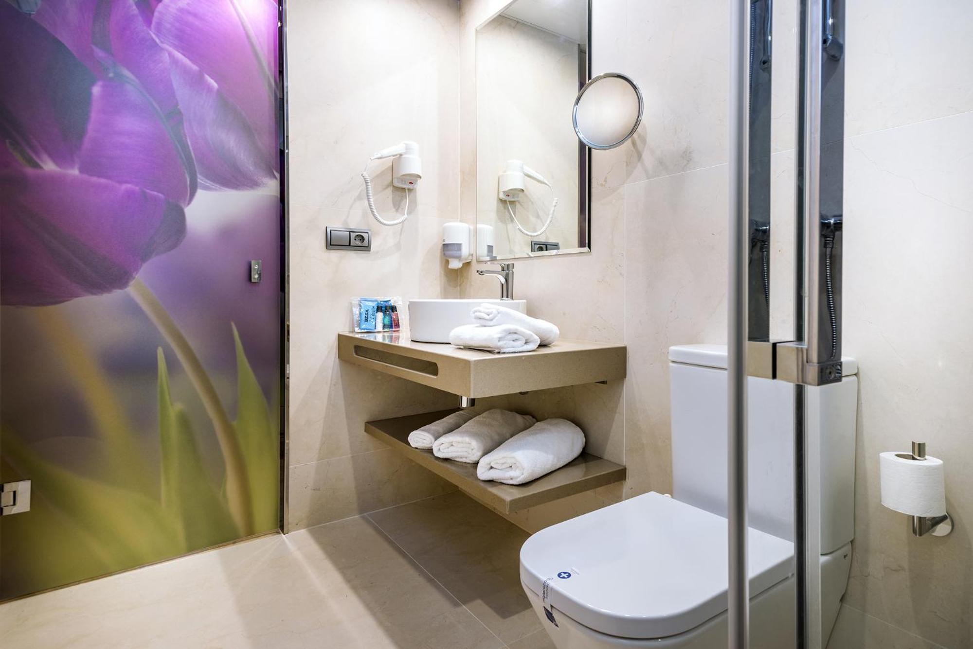 Habitación Doble con balcón (3 adultos)