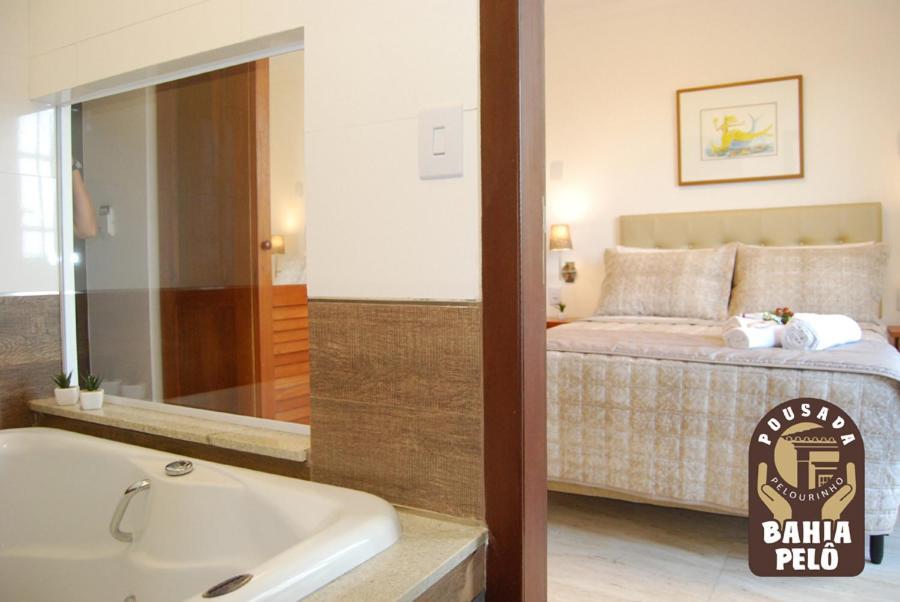 Quarto Duplo com Banheira de Hidromassagem