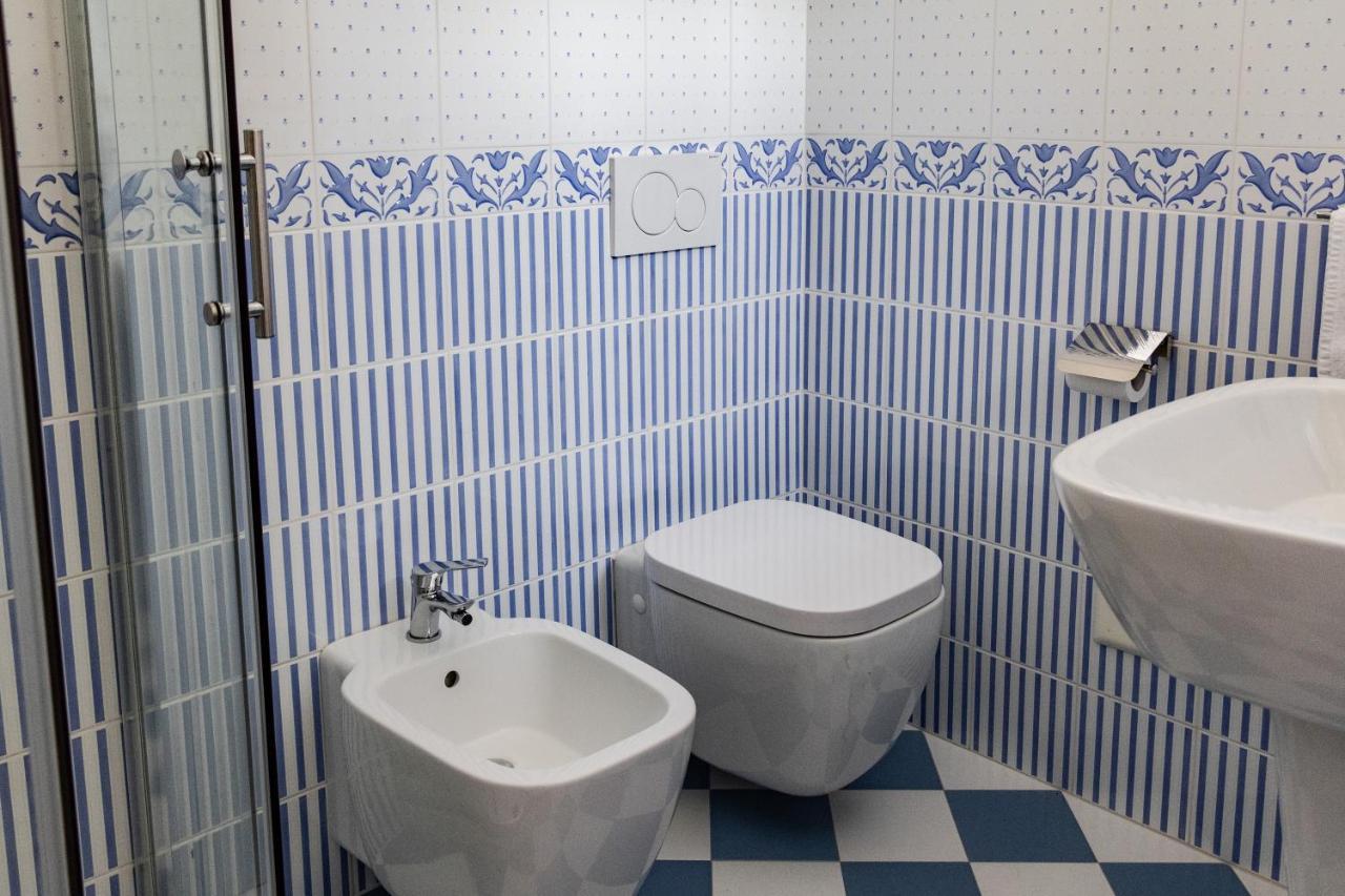 Tweepersoonskamer met 2 Aparte Bedden en een Extra Bed