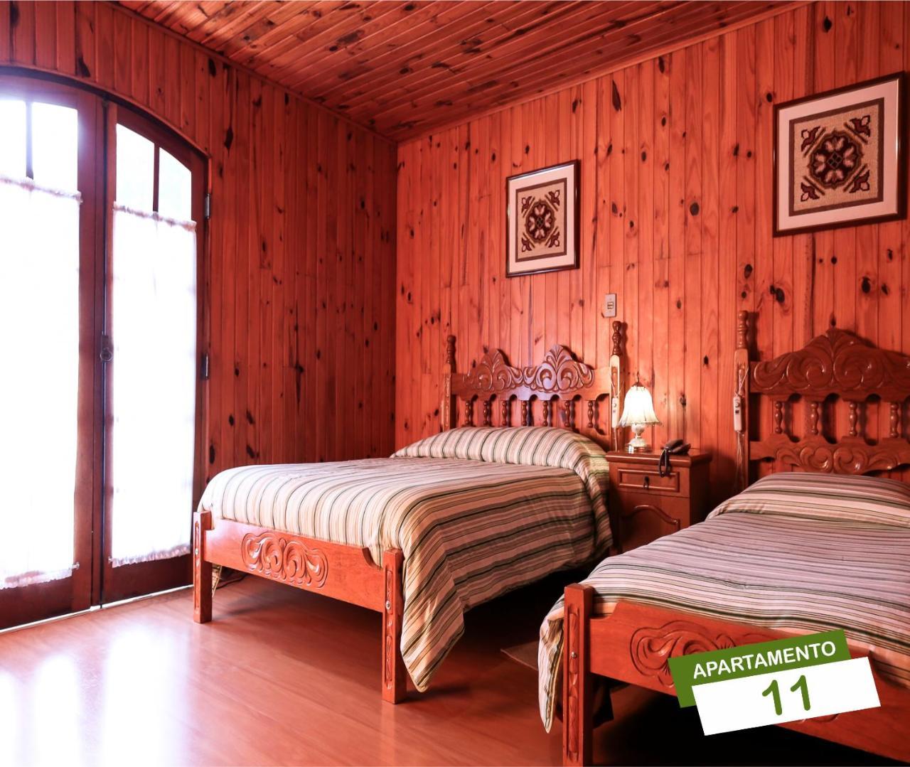 Quarto Triplo com Varanda