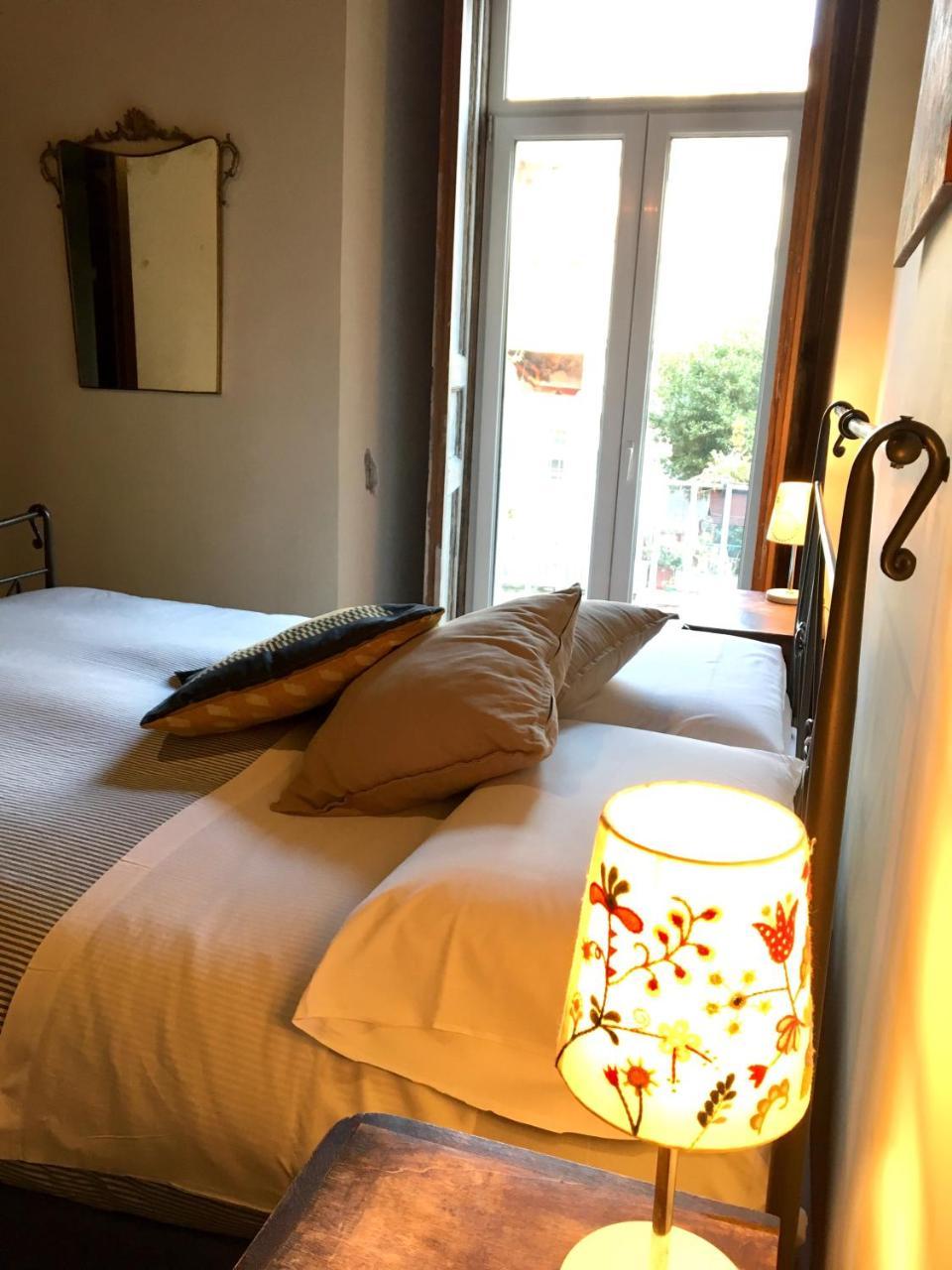 Dreibettzimmer mit Gartenblick