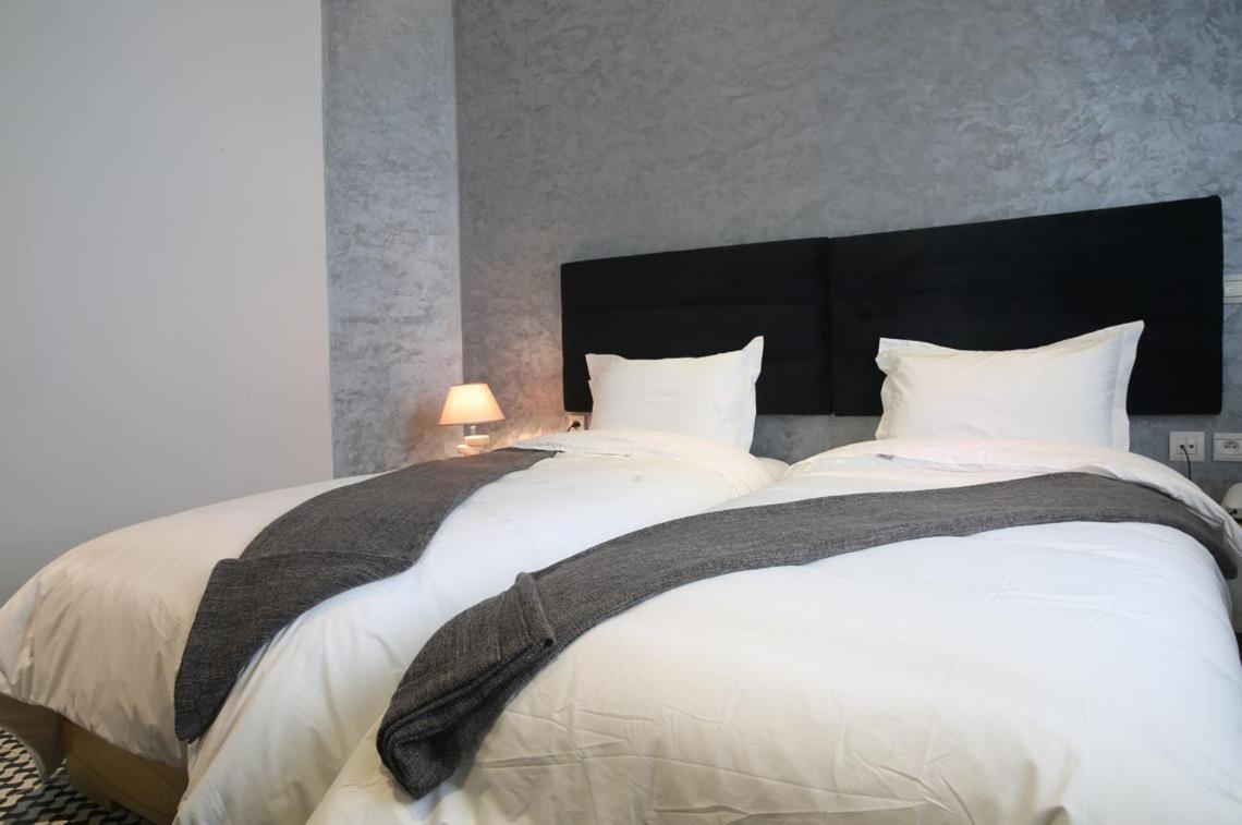 Quarto com 2 Camas de Solteiro