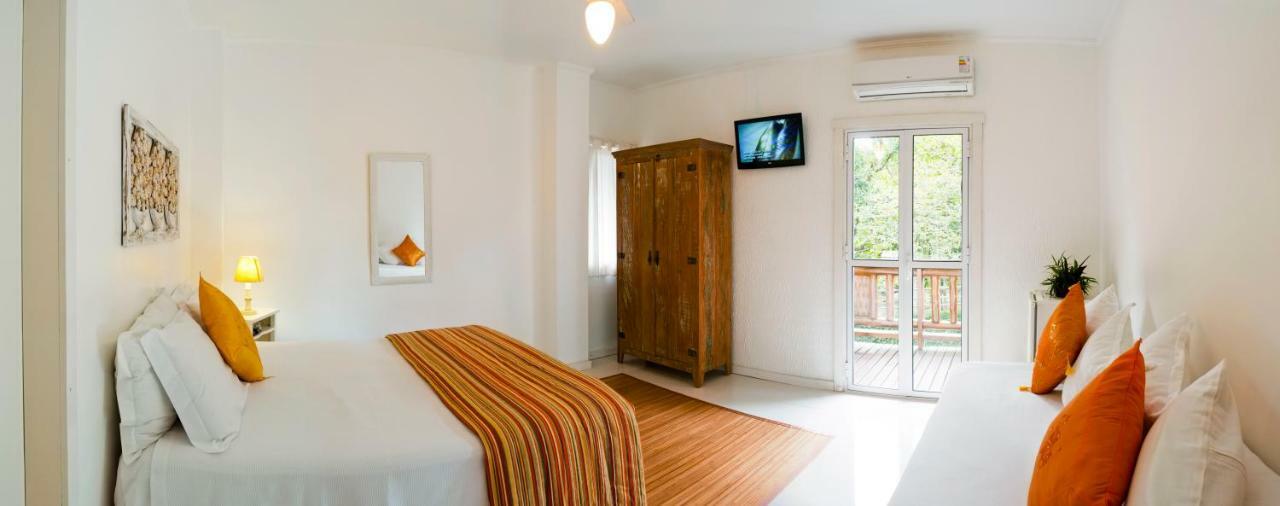 Quarto Triplo com Varanda