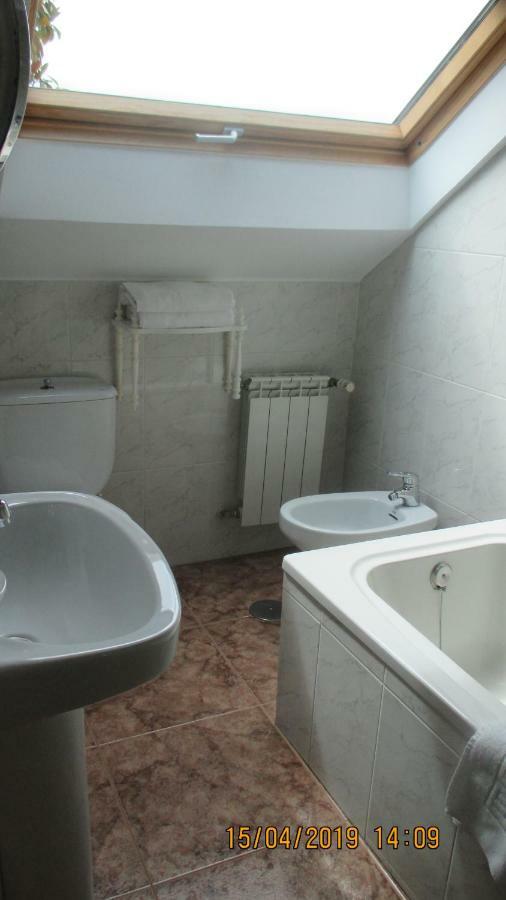 Quarto Familiar (2 Adultos + 2 Crianças) com Estacionamento Incluído