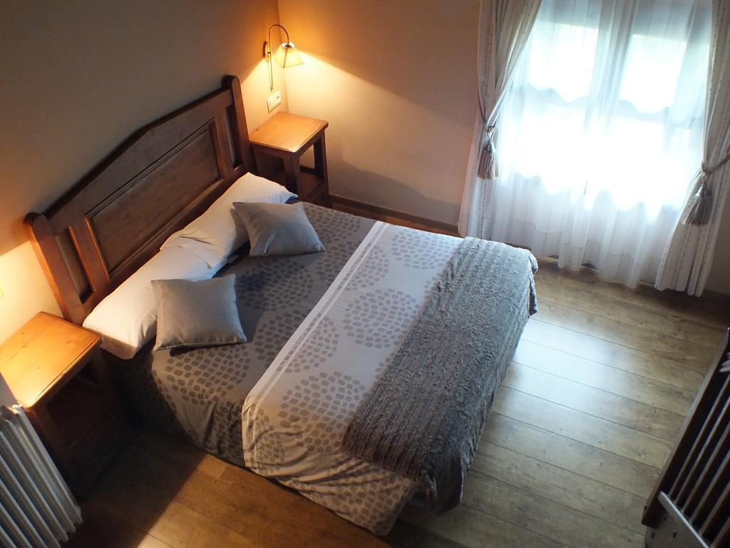 Habitación Cuádruple (2 adultos + 2 niños)