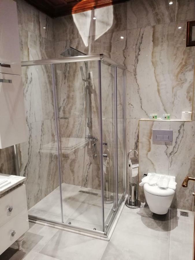 Dreibettzimmer mit Gartenblick