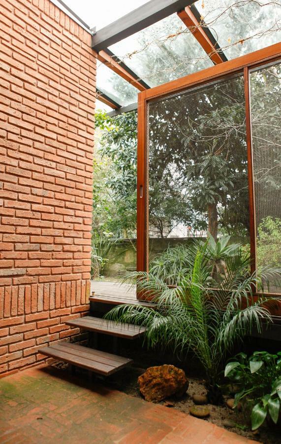 Quarto Duplo com Pátio e Vista Jardim