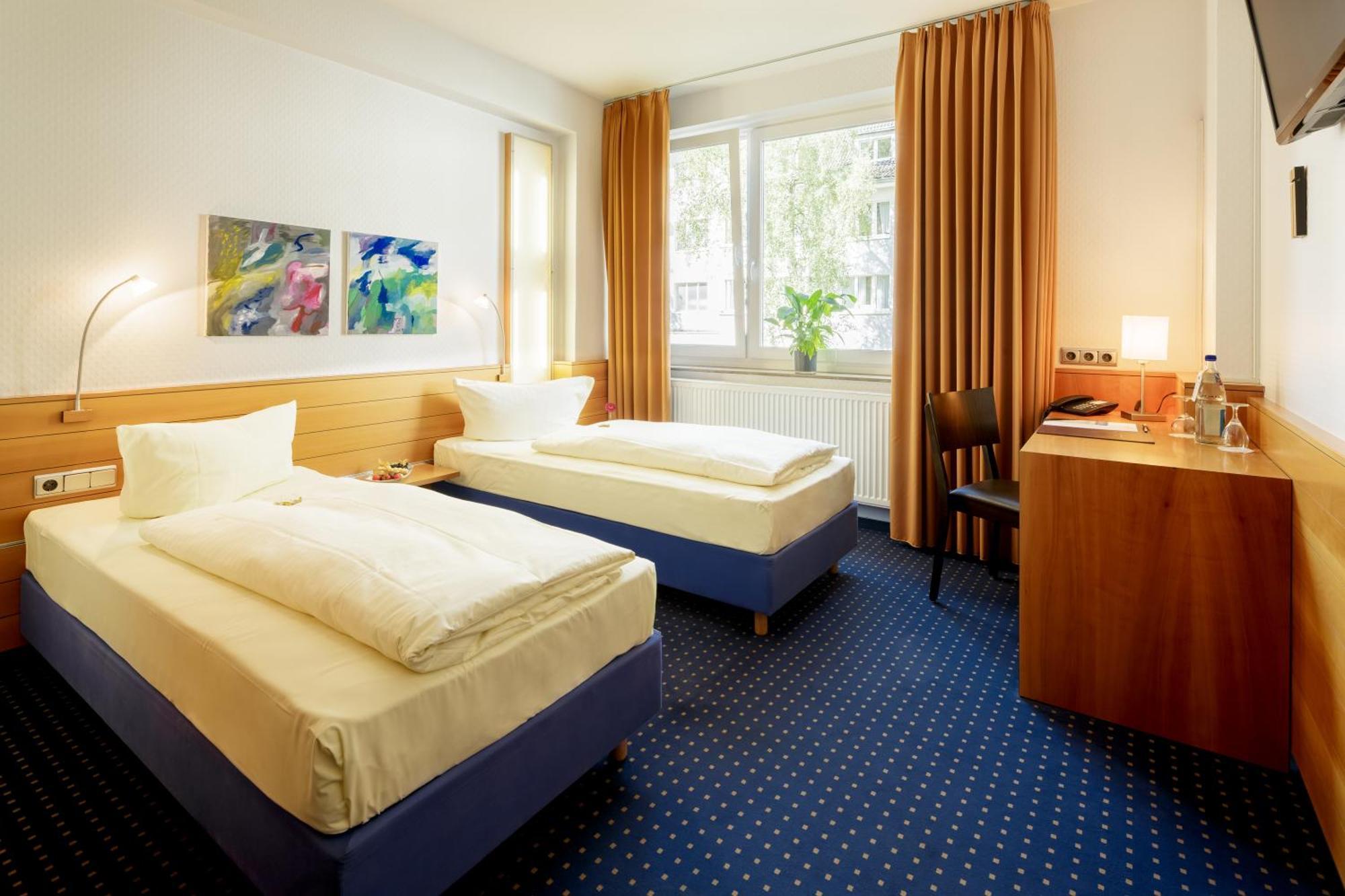 Doppel- oder Zweibettzimmer