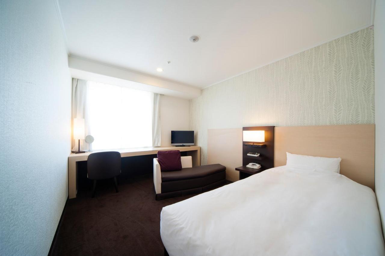 Deluxe Single Room - Non-Smoking,697606398:JPEG