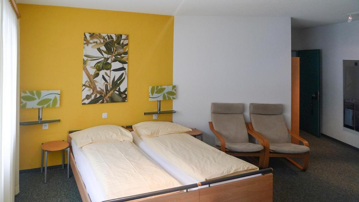 Dreibettzimmer mit Bergblick