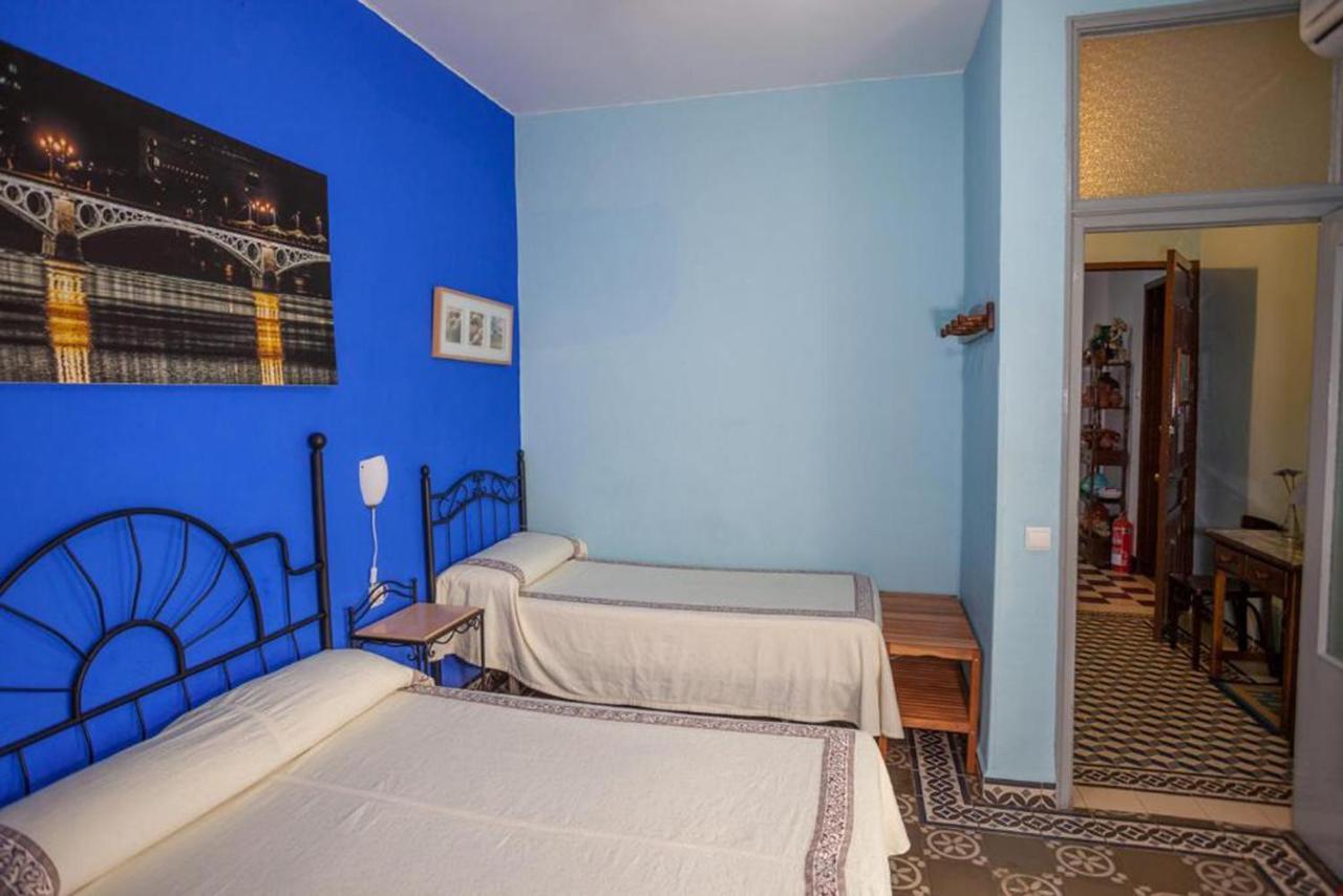 Quarto Triplo com Casa de Banho Privativa