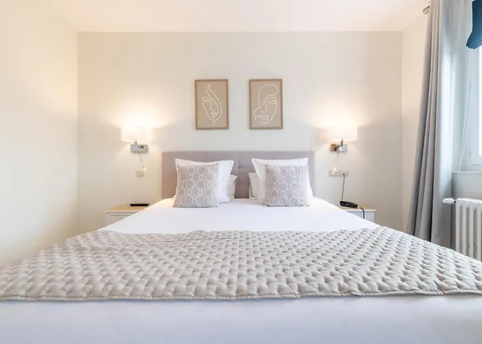 Hôtel Échappée en Baie - Parking privé gratuit