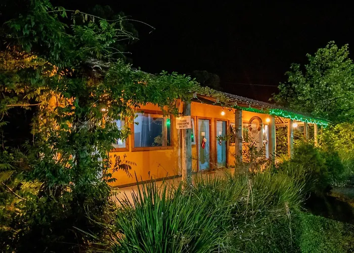 Pousada Jardim do Buda com café e piscina