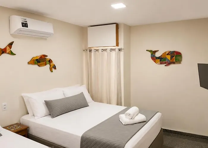 SEGUNDA CASA - Seu cantinho em Guarapari, 1 minuto a pé da Praia do Morro! Suítes confortáveis e modernas - Para casal ou para grupos de até 5 pessoas