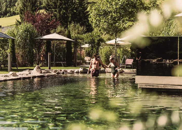 Wellness Und Brunch Hotel Morgenzeit Beheizter Naturteich Genuss Fruehstueck Bis 13 Uhr Hochkoenig Sommercard Maria Alm am Steinernen Meer